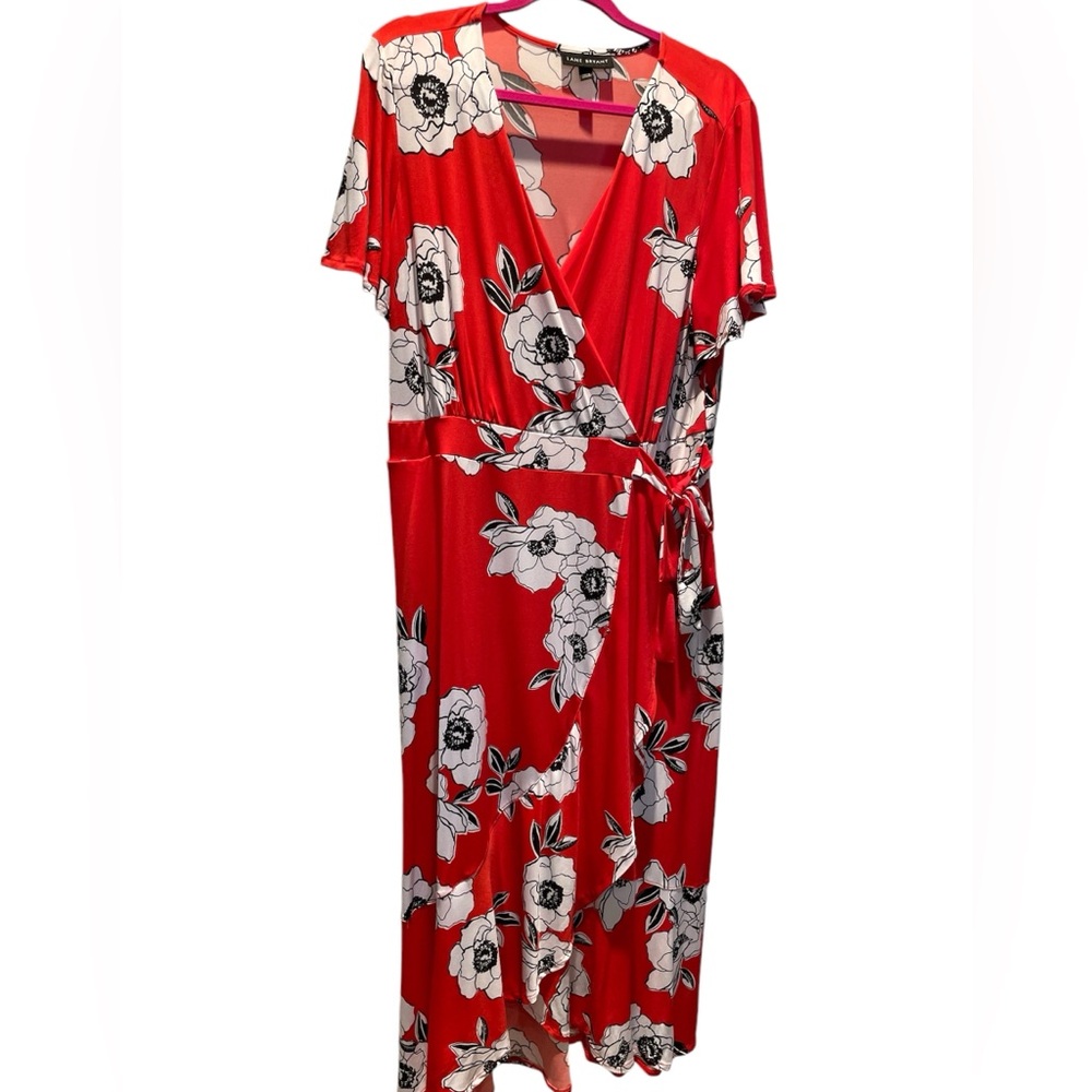 Adorable bright red floral faux wrap dress.  Pattern black and white florals.